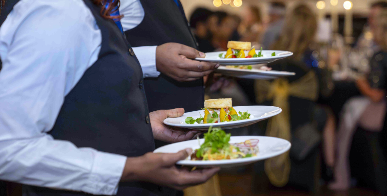 Dinner being served by 1599 team